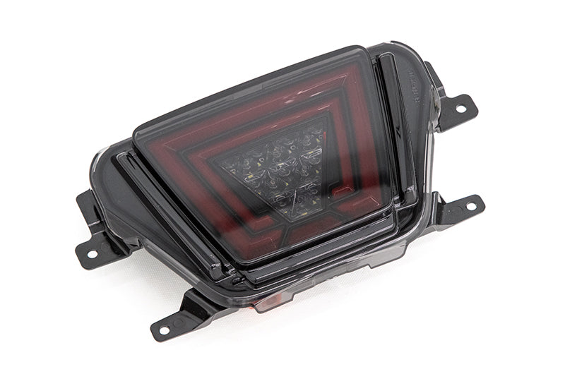 OLM V1 Multifunction Rear Fog Light (Smoke Lens, Gloss Black Base, Red Bar) - 2020+ Supra