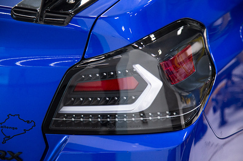 OLM Evolution Tail Lights (Clear Lens, Black Base, White Bar) - 2015-2
