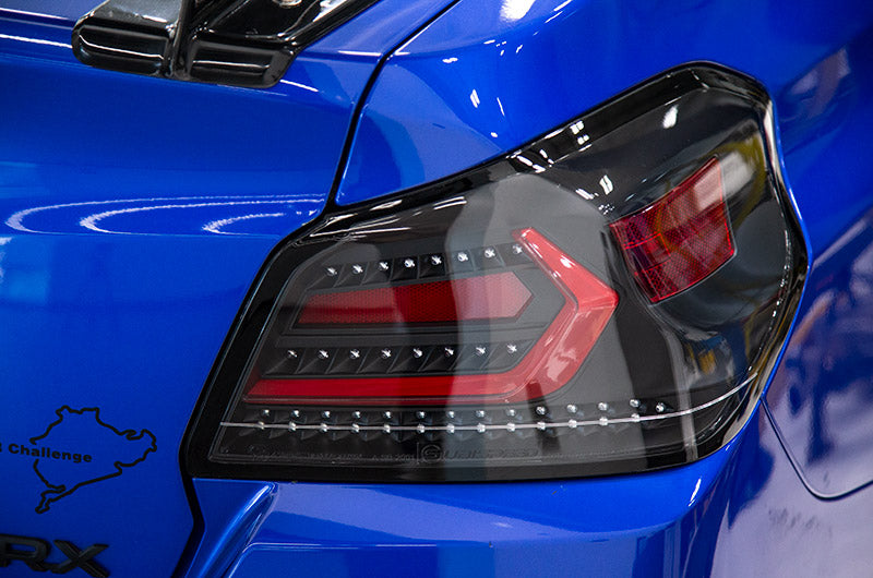 OLM Evolution Tail Lights (Clear Lens, Black Base, Red Bar) - 2015-202