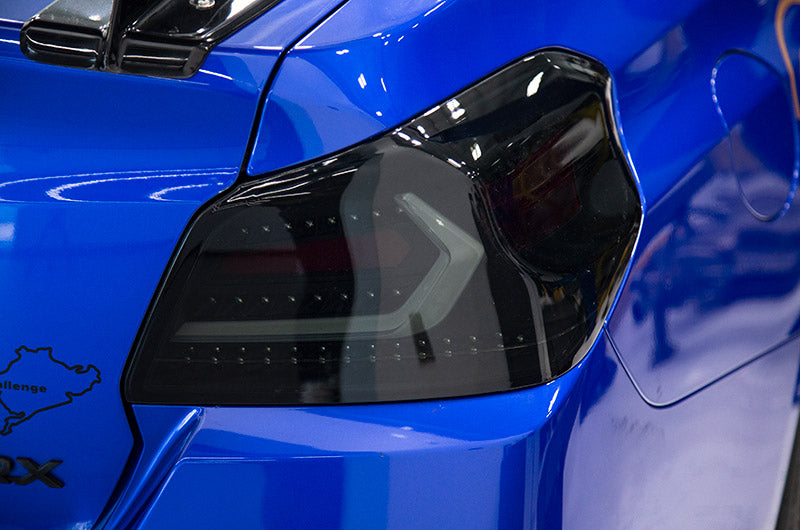 OLM Evolution Tail Lights (Smoked Lens, Black Base, White Bar) - 2015-
