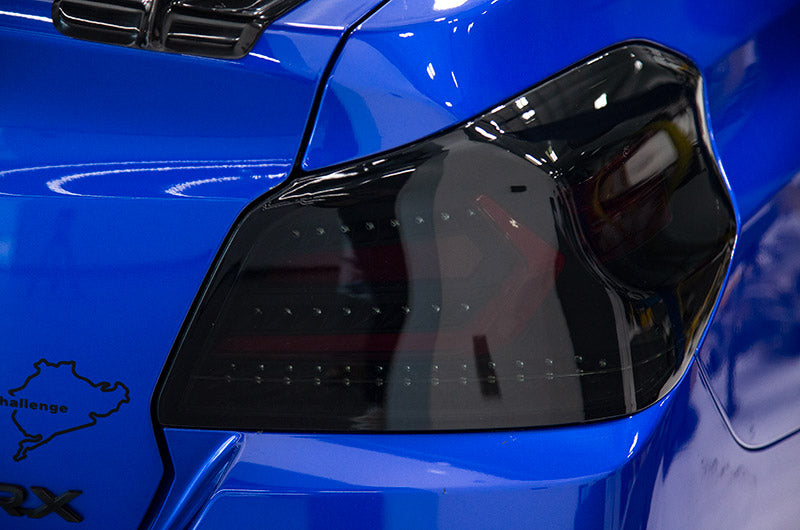 OLM Evolution Tail Lights (Smoked Lens, Black Base, Red Bar) - 15+ WRX