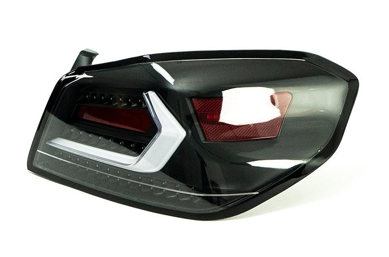 OLM Evolution Tail Lights (Clear Lens, Black Base, White Bar) - 15+ WR